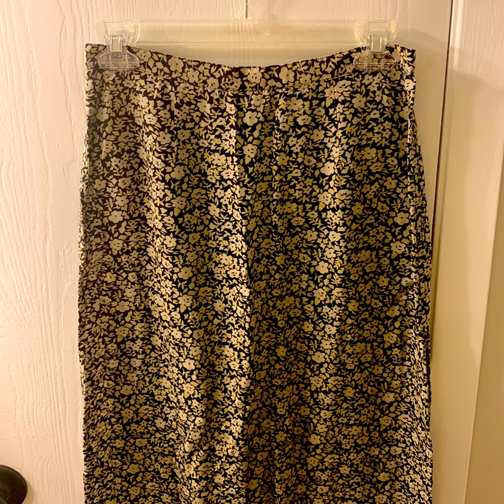 Ankle length straight skirt. Black and tan, floral print.